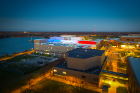 The Center for the Arts showed its support of the hometown team by lighting the Atrium in the Buffalo Bills' colors of red, white, and blue as the team took on the Kansas City Chiefs, with the winner earning a spot in the Super Bowl. Photographer: Meredith Forrest Kulwicki