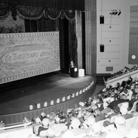 audience watching a performance during the opening of the drama theatre.