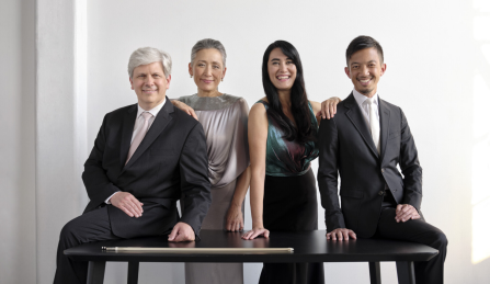 Borromeo Quartet posing on a bench. 