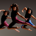 three dancers suspended in air. 
