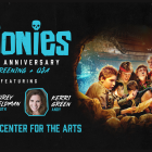 drawing of the characters from the goonies with headshots of corey feldman and kerri green. 