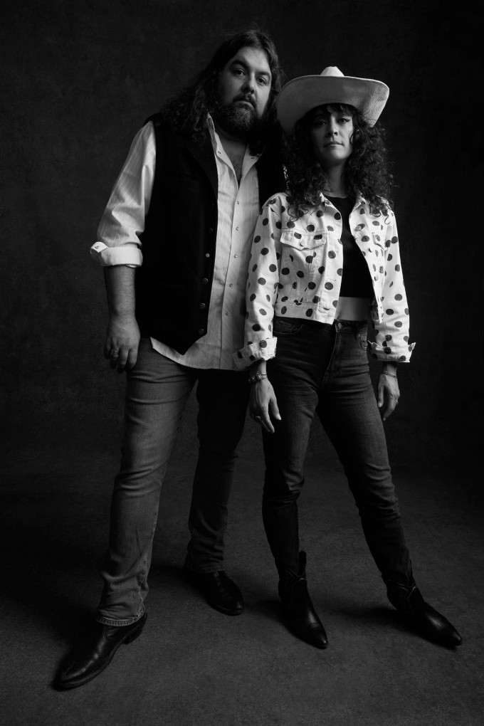 Samoa Wilson and Sean Walsh posing. 