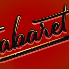 Cabaret in cursive in front of a solid background with the C as a cane with a bowler hat hanging off the end. 